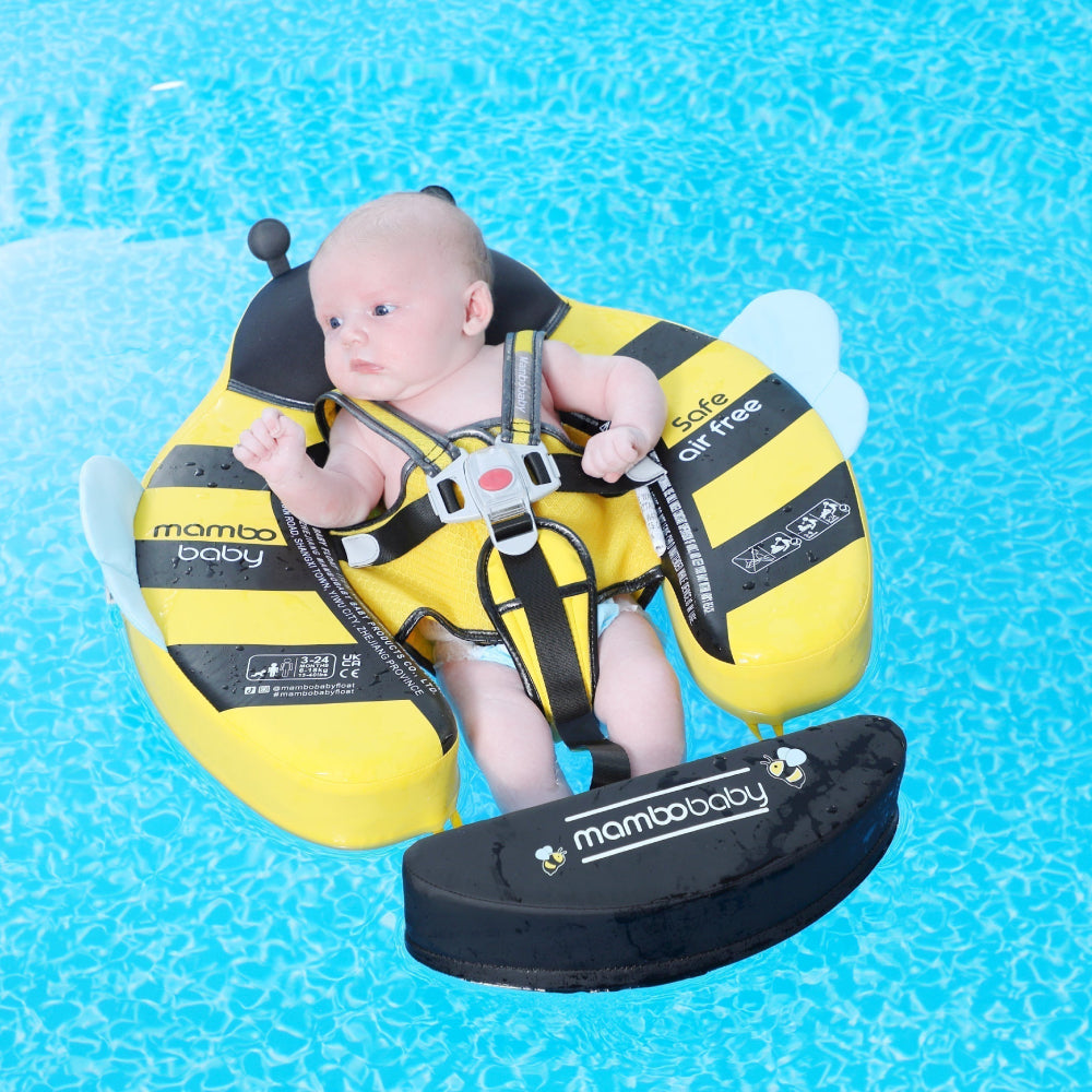 A happy baby safely enjoying the water in a Mambobaby™ Bee Float, demonstrating stable 360-degree protection.